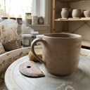 There's something profoundly grounding about the art of pottery. This morning, I found myself drawn to the simplicity and beauty of a freshly thrown mug, still bearing the marks of creation. It sits quietly on the wheel, surrounded by jars of vibrant glazes and other pieces patiently waiting their turn in the kiln. This studio is a reminder of the power of creativity—how it can transform raw, unformed clay into something both functional and beautiful.
In many ways, this process mirrors the work I do in my community. Just like shaping pottery, building a stronger, more equitable neighborhood requires patience, vision, and a willingness to get your hands dirty. Each piece, each person, holds potential. It's about nurturing that potential and bringing out something remarkable. Today, I'm reminded that whether in art or advocacy, the journey of creation is where true purpose and fulfillment lie.